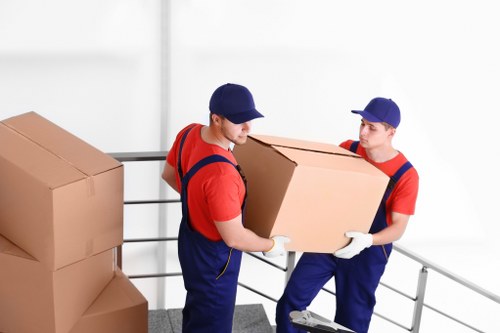 Van moving team preparing items safely for a Deptford house move