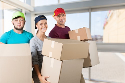 Packed boxes and furniture ready for local relocation