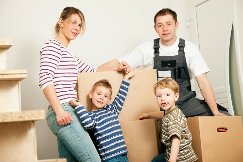 Removal team planning a house move in Deptford street