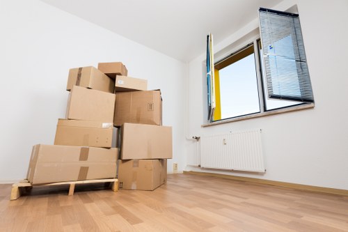 Commercial relocation equipment and office items being moved in Deptford