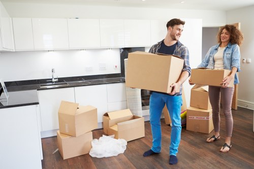 Packed boxes and furniture ready for residential removals in Deptford