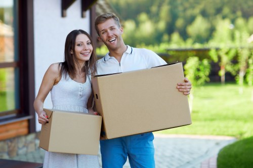Careful wrapping of fragile household items for a Deptford move