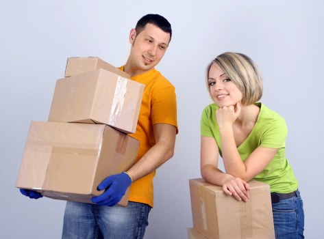 Prepared moving boxes in a Deptford home before relocation