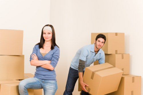 Careful loading of household items during a Deptford house move