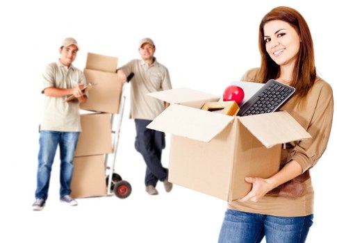 Packed moving boxes and furniture ready for local removal