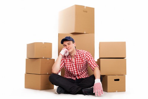 Packed boxes and furniture ready for a home move in Deptford