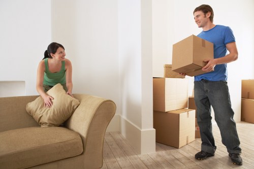 Professional van moving household items in Deptford street